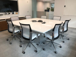 Ultra Modern Silver Shadow Conference Chairs installed around marble table