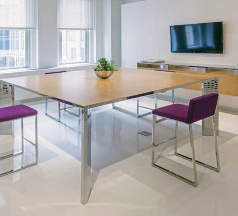 Square Stainless Steel Wood Meeting Table shown in exotic wood. Top available in other materials and colors. Available in many sizes and shapes with choice of top materials. Seated height table. Matching floating wall hung credenza in stainless steel, wood and glass. Impeccable quality and craftsmanship.