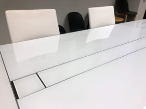 Outstanding Luxury hand cut white glass conference table detail